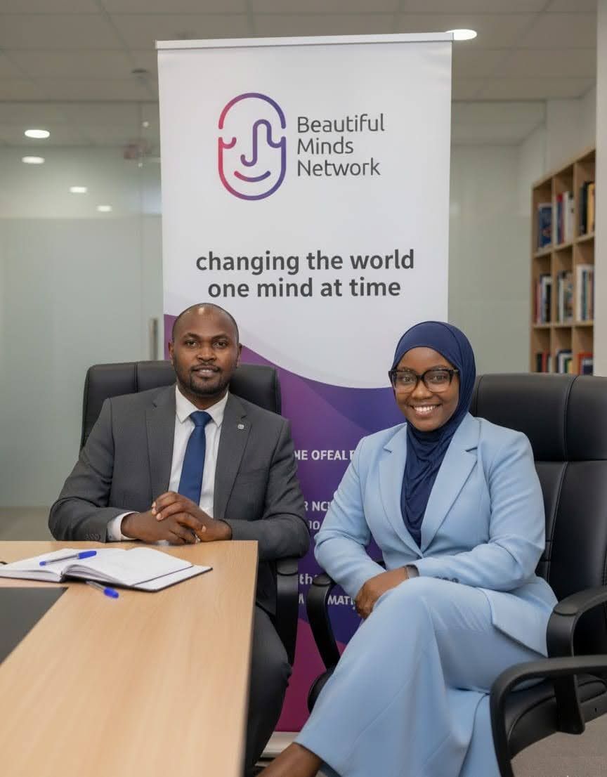 Ameerah Nyakiere Mungai, Founder and Lead Trainer, and CPA Zachary Munyi, Co-Founder and CEO, of Beautiful Minds Network, seated at a partnership meeting