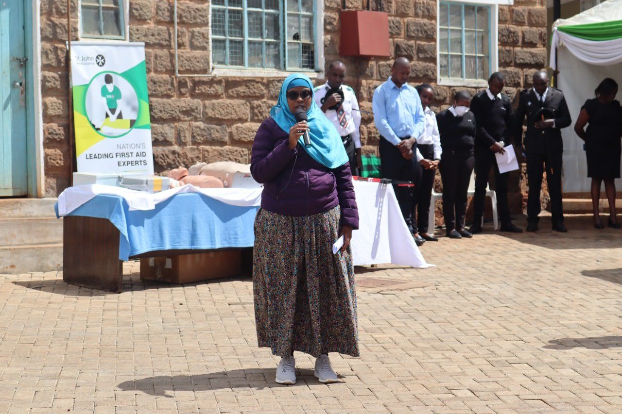 A facilitator addressing a crowd at a St John Ambulance first aid and awareness event